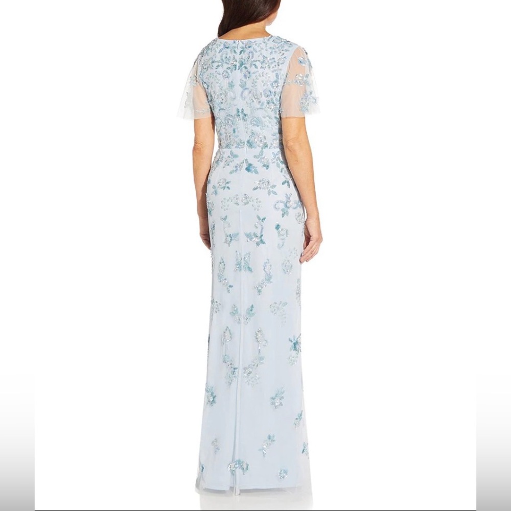 Light blue beaded Aidan Mattox v-neck short sleeved gown